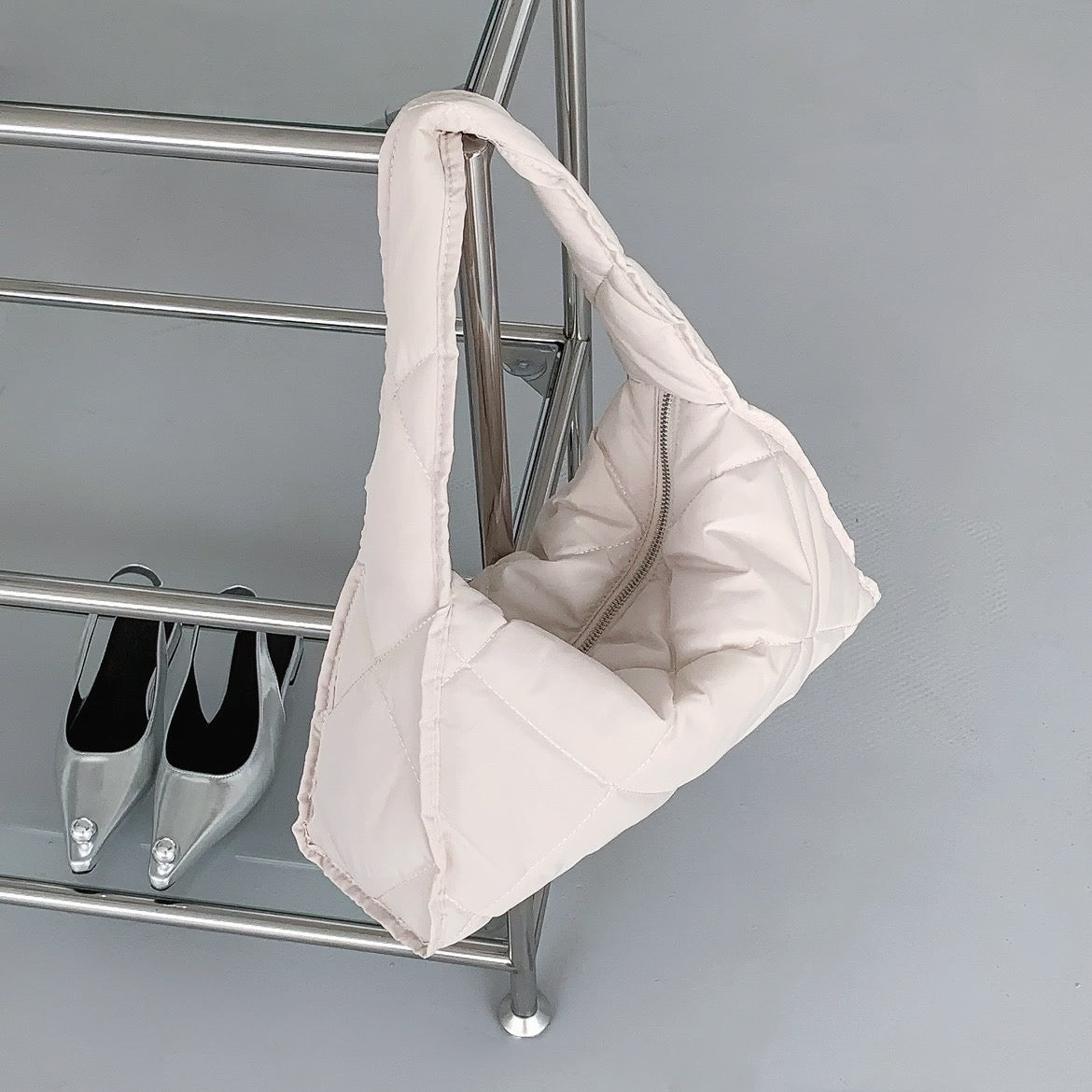 Trapeztasche mit Rautensteppung