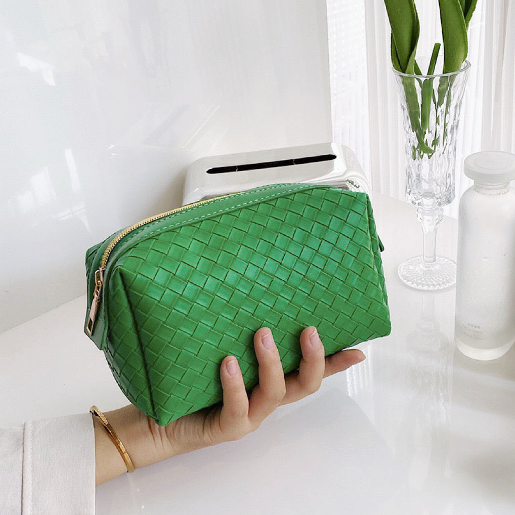 Borsa per il trucco in pelle intrecciata