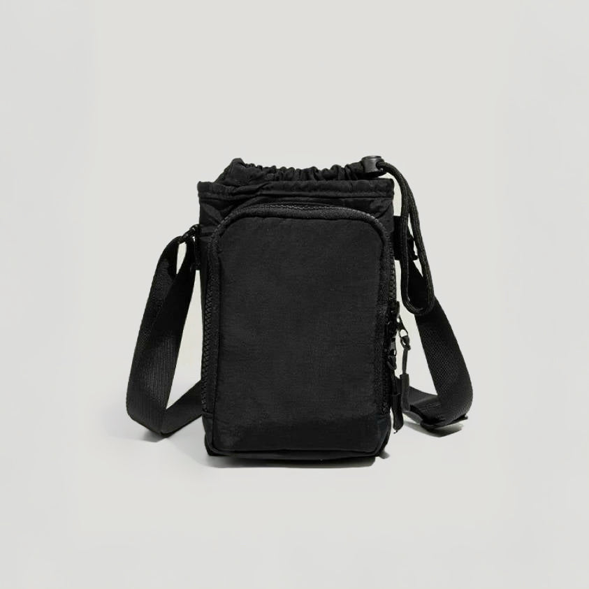 A versatile black water bottle carrier with an adjustable strap, ideal for aesthetic travel photography and short-distance hiking.