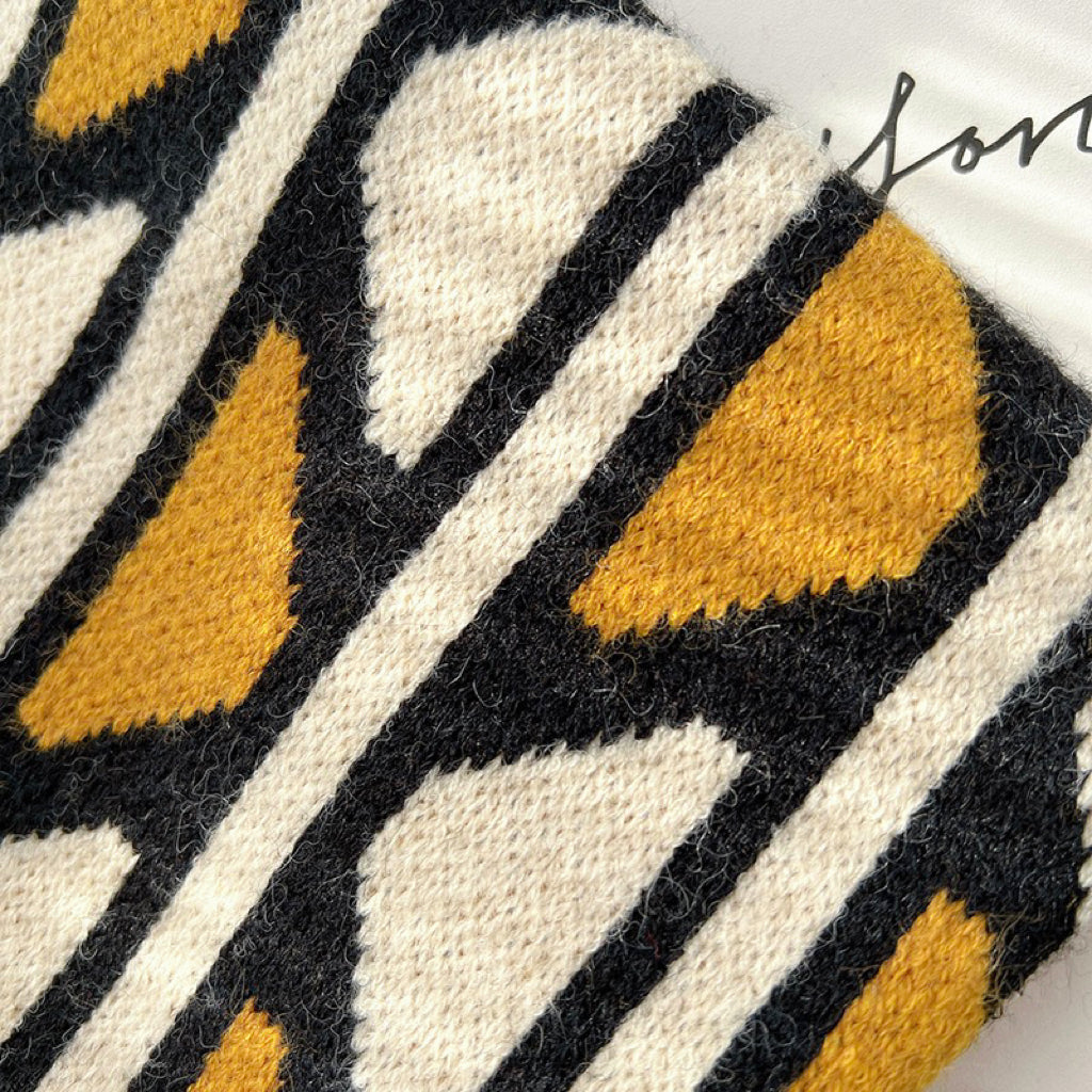Detail view of Geometric Contrast Color Knitted Tote Bag, showcasing the knitted fabric.