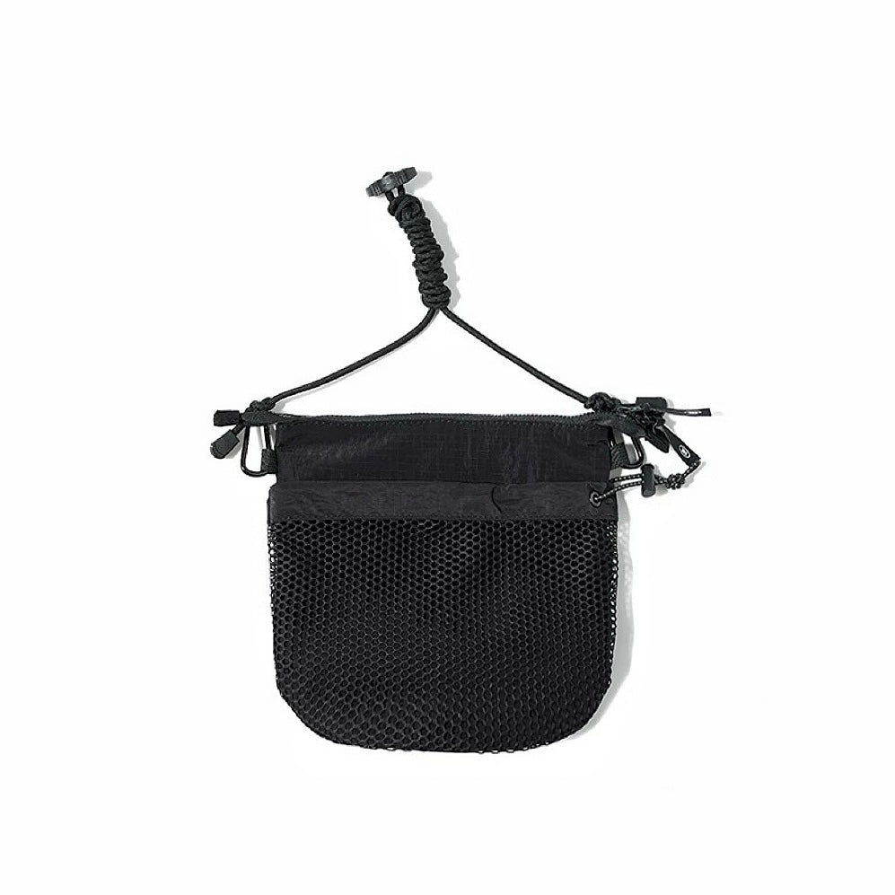 Folded view of Mesh Vogue Crossbody Bag in black, great for everyday carry and travel.