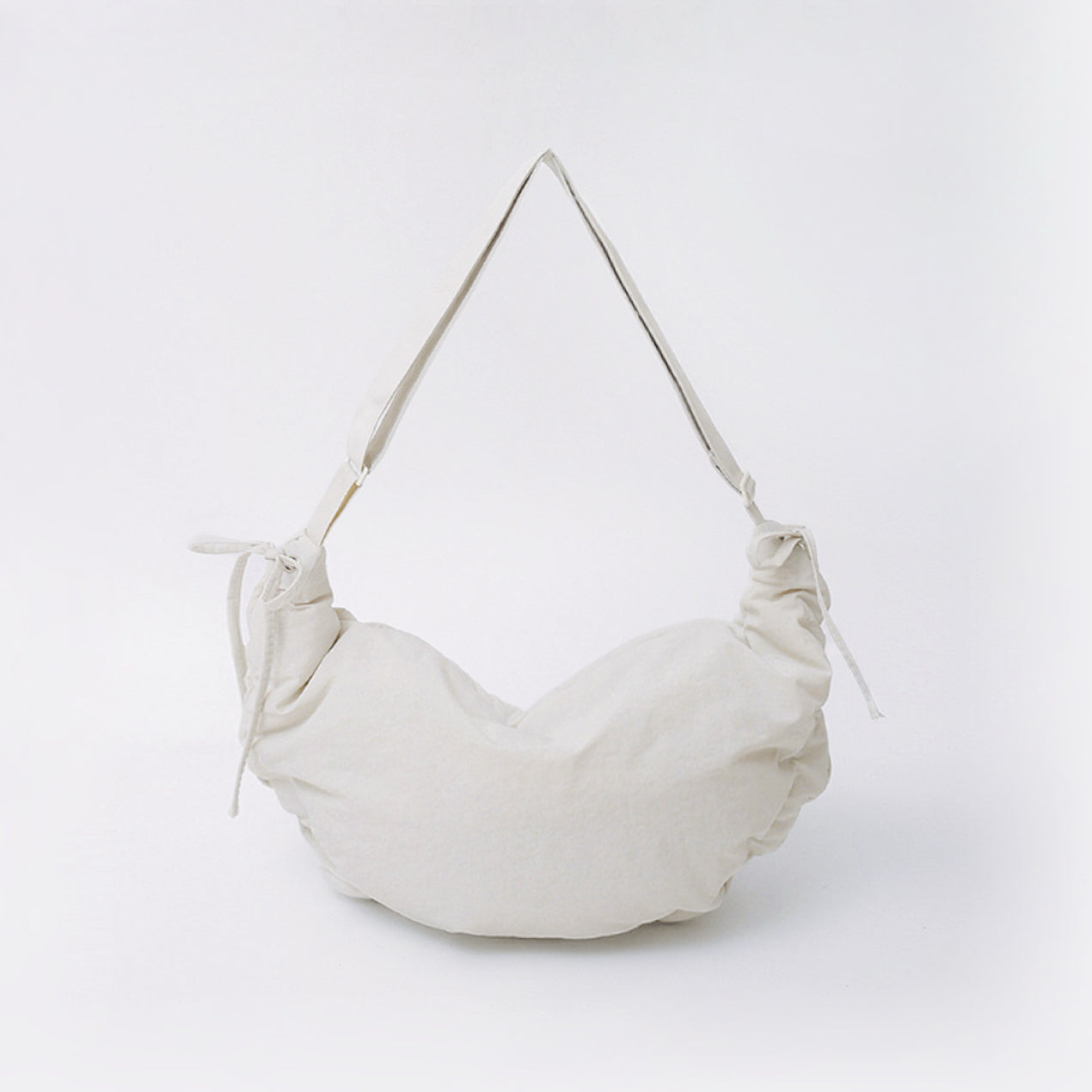 Off-white mini duvet crescent bag displayed on a clean white background.