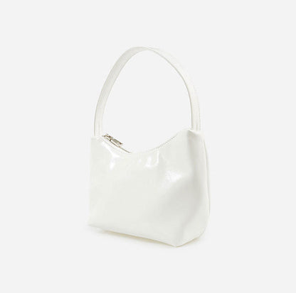 Borsa a tracolla in vernice alla moda