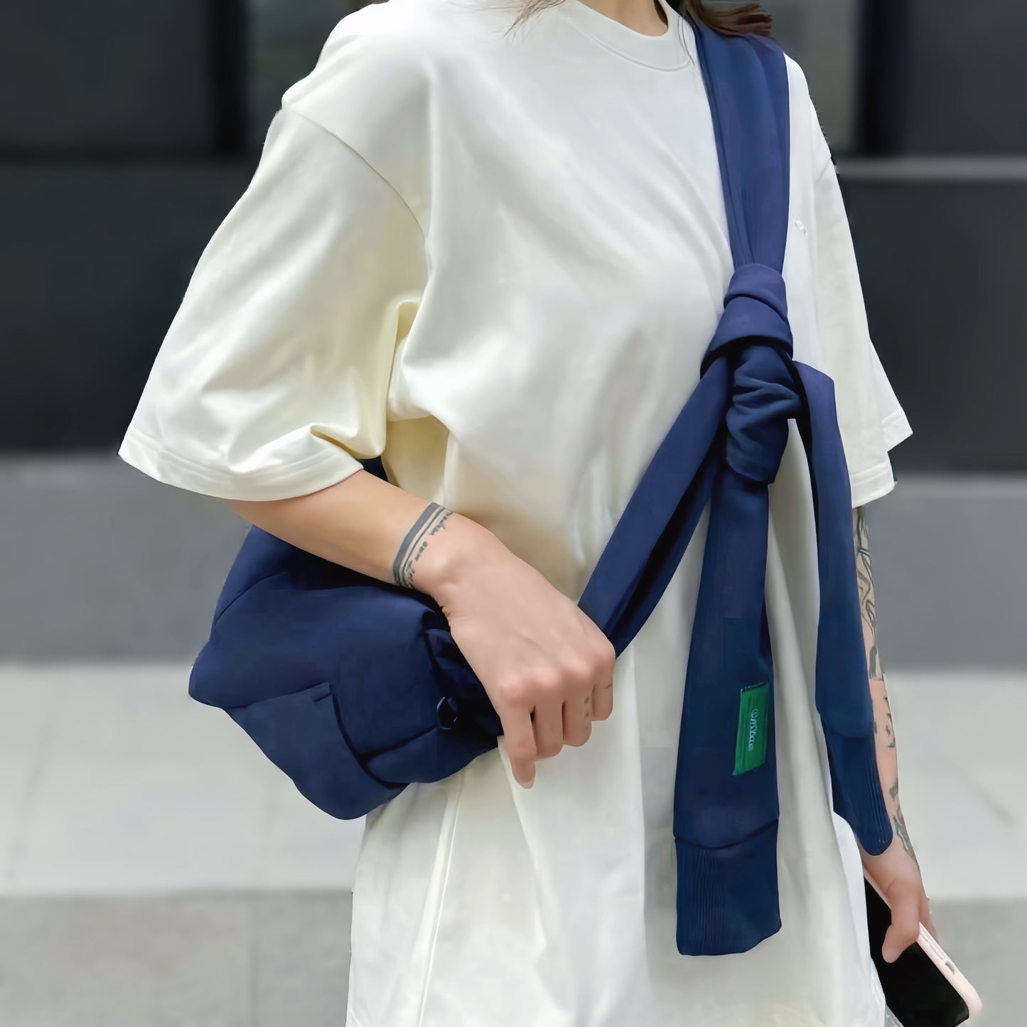 Borsa con manicotto Twist &amp; Tie