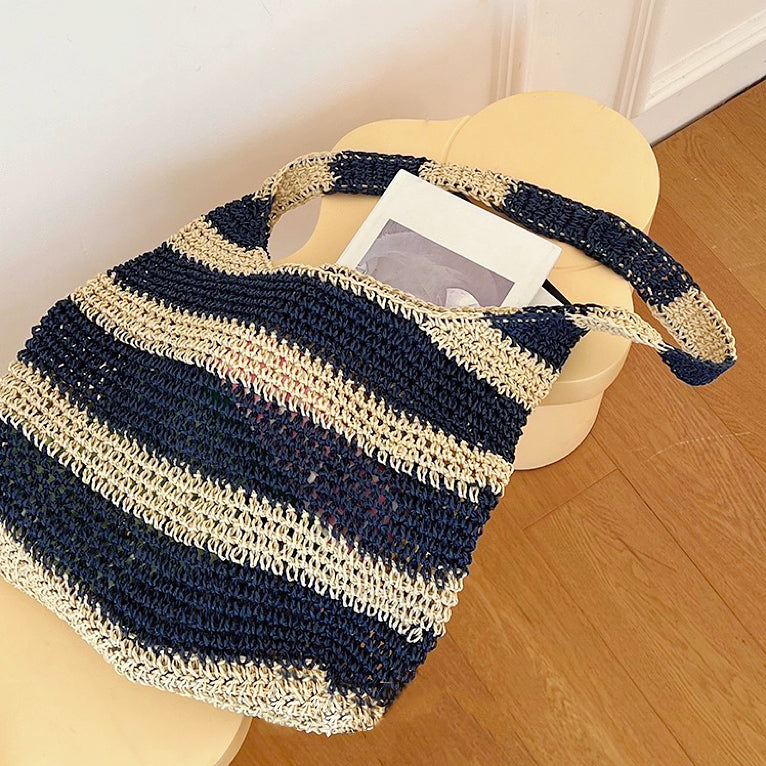 Borsa tote in paglia lavorata all'uncinetto a righe blu