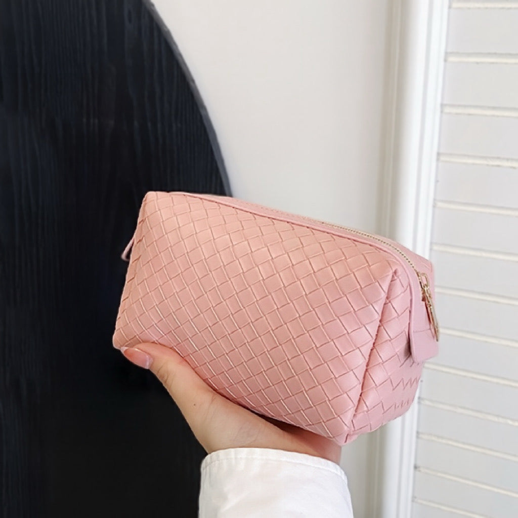 Borsa per il trucco in pelle intrecciata 