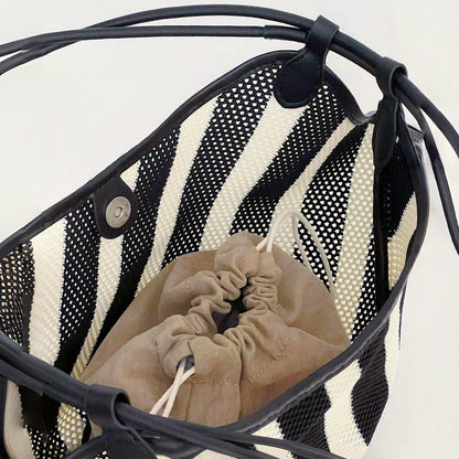 Top view of Black And White Striped Basket Bag, showing the interior.