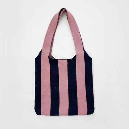 Front view of Pink and navy striped wool blend knit shoulder bag,  great for everyday carry and travel.