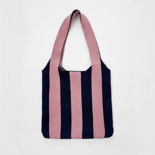 Front view of Pink and navy striped wool blend knit shoulder bag,  great for everyday carry and travel.