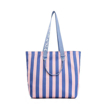 Front view of Bold Color Striped Tote Bag in violet, ideal for errands and gifting.