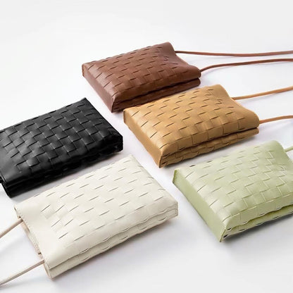 Front view of Five woven PU leather crossbody bags in black, white, brown, tan, and light green crossbody bag Braid.