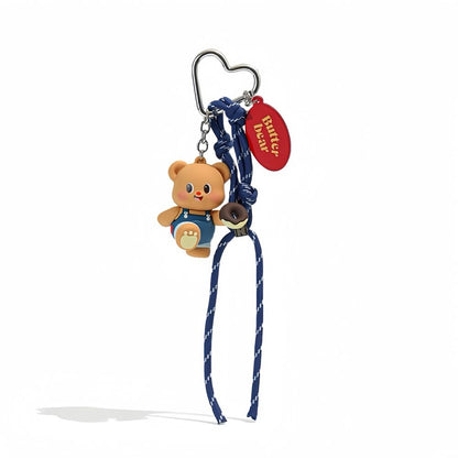 Front view of Cute Butter Bear bag charm with blue rope and heart-shaped alloy keyring.