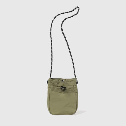 Close-up of a bag in  olive green, ideal for errands and gifting.