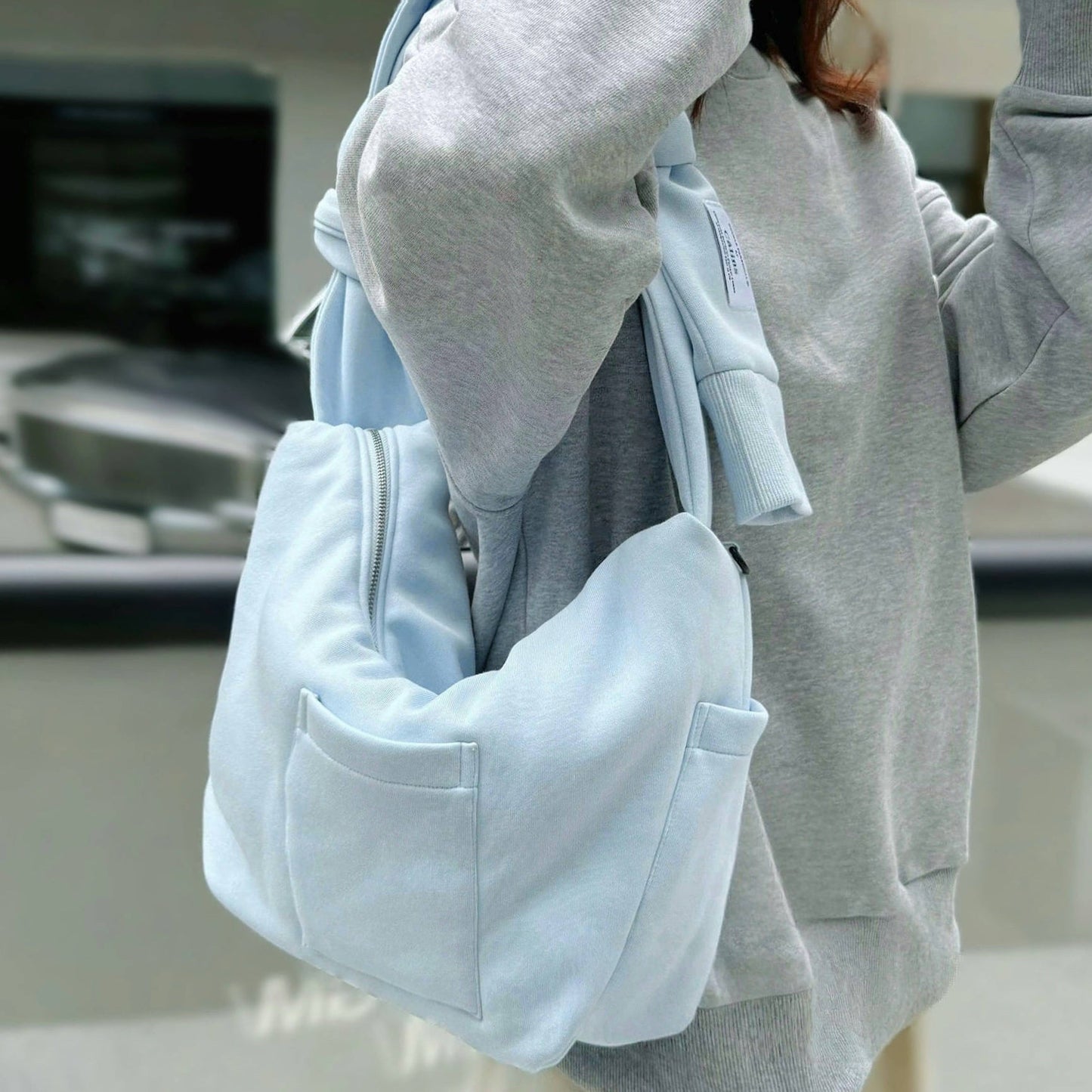 Borsa con manicotto Twist &amp; Tie
