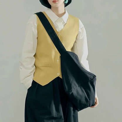 Model carrying a  Chic Day Hobo Bag in black, easy for commuting and weekends.