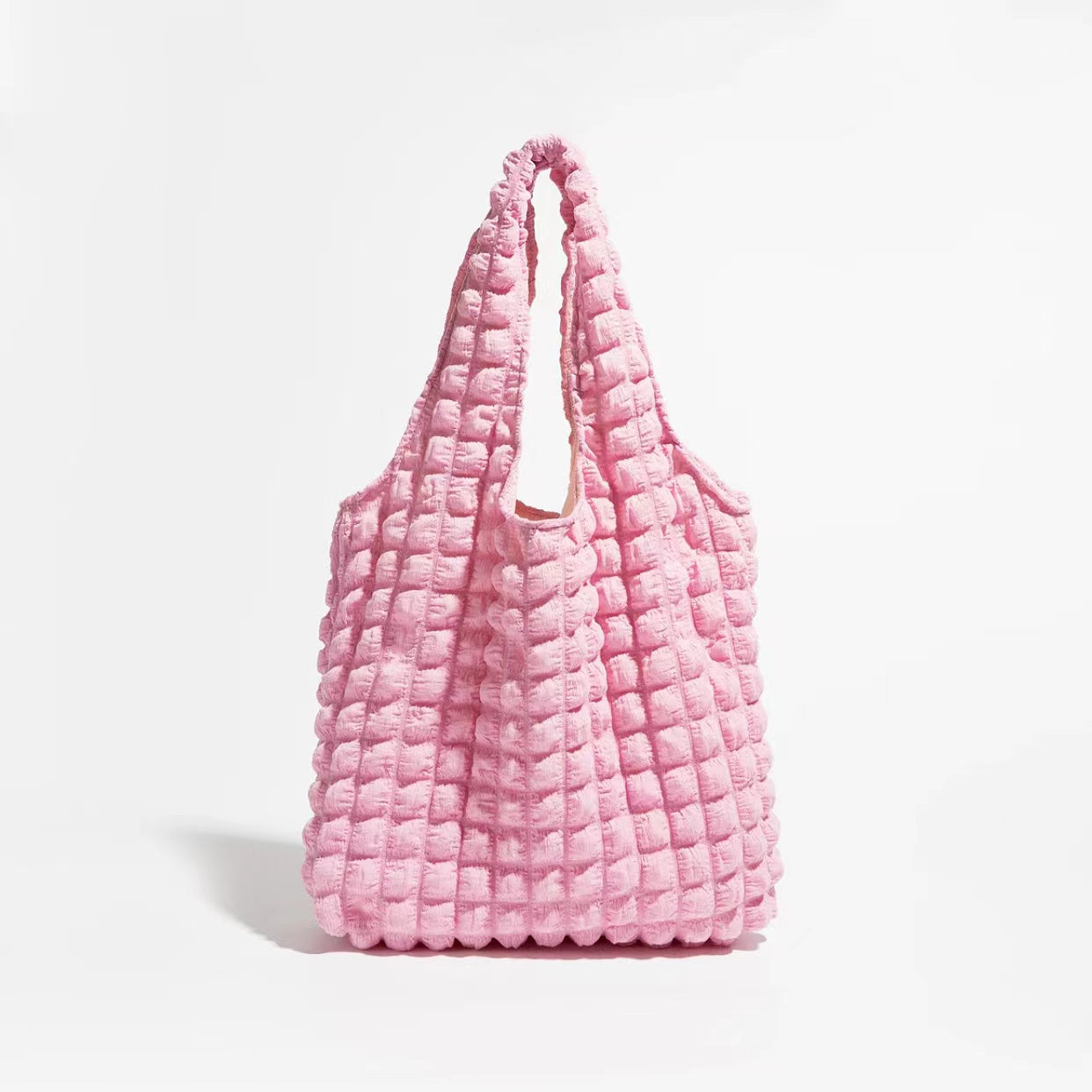 Front view of the pink cloud puff tote bag against a white background.