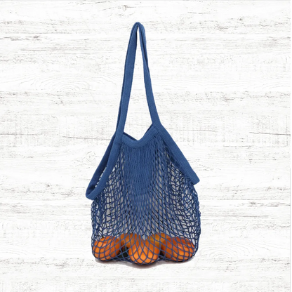 Folded view of Colorful Net Shopper Bag in blue, easy for commuting and weekends.