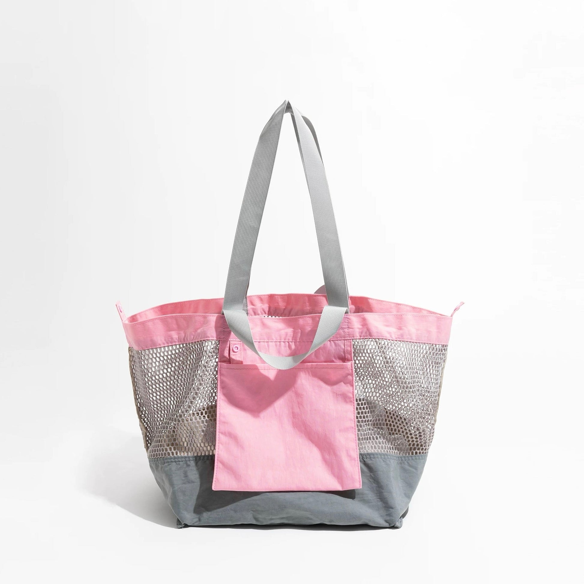 Front view of the soft pink and grey reversible tote bag.