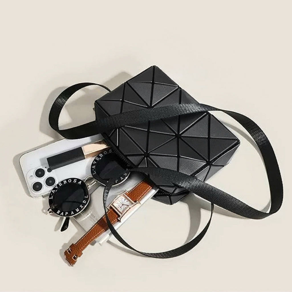 Flat lay of GeoChic Crossbody Bag, showcasing the interior.
