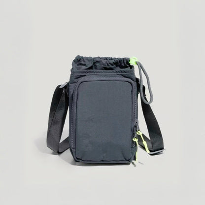 A minimalist grey water bottle designed to hold water bottle and smartphone for outdoor activities.