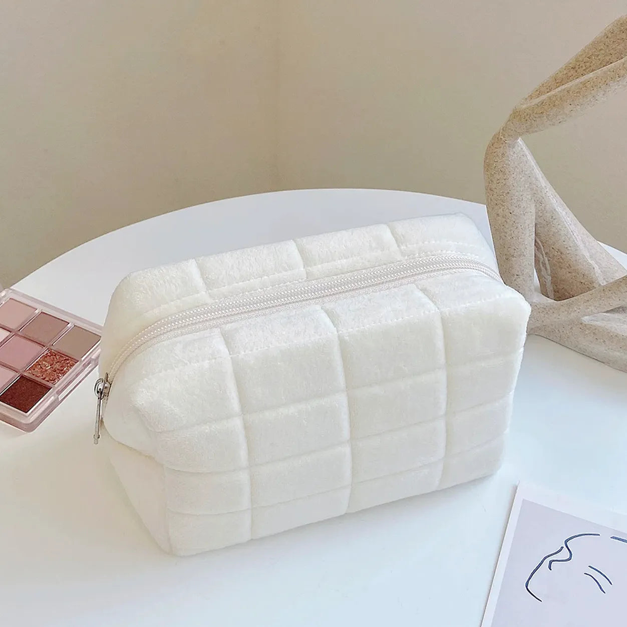 Front view of Icecream Makeup Bag in white, easy to pack for trips and daily use.