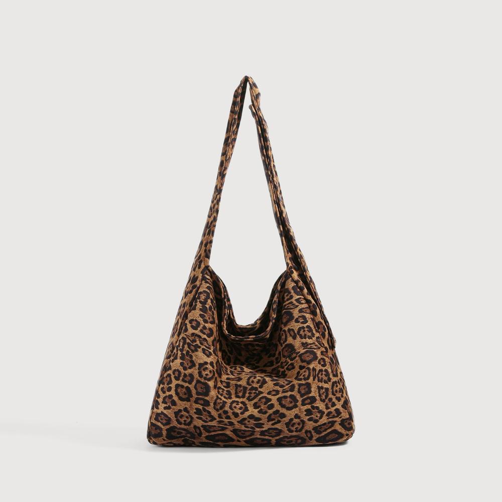 Large slouchy tote bag featuring a classic brown and black leopard print.