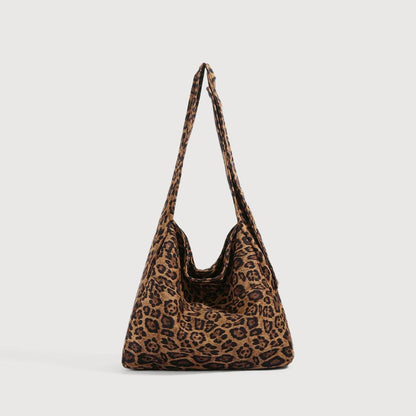 Large slouchy tote bag featuring a classic brown and black leopard print.