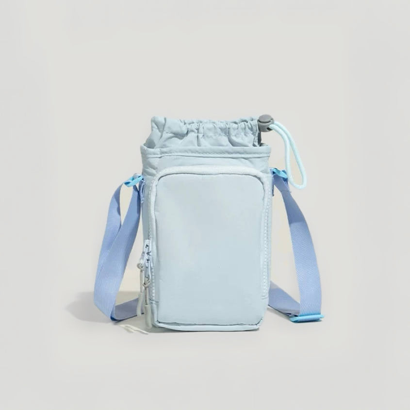 A light blue technical fabric water bottle carrier with an adjustable strap and durable nylon finish.