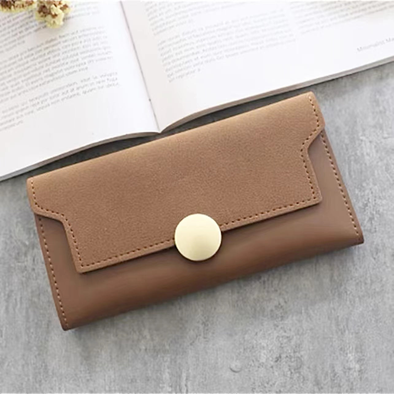 Front view of Long Wallet With Nubuck Leather Flap in brown, ideal for commuting and gifting.