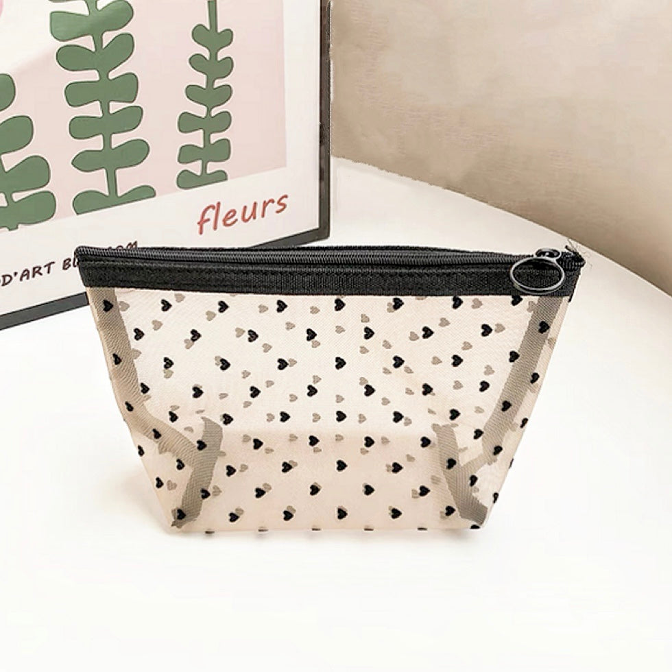 Trapezoid shaped organza cosmetic pouch; stylish and lightweight mesh organizer under $20.
