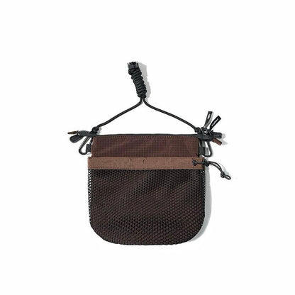 Angled view of Mesh Vogue Crossbody Bag in brown, ideal for errands and gifting.