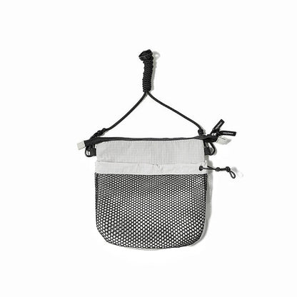 Folded view of Mesh Vogue Crossbody Bag in gray, easy for commuting and weekends.