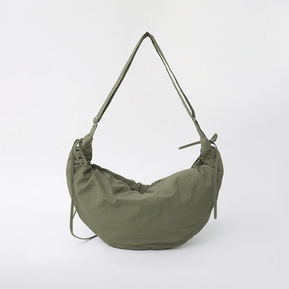 Olive green version of the duvet crescent bag featuring the ruched texture.