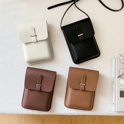 Front view of Four minimalist rigid PU leather crossbody bags in white, black, brown, and tan with loop through.