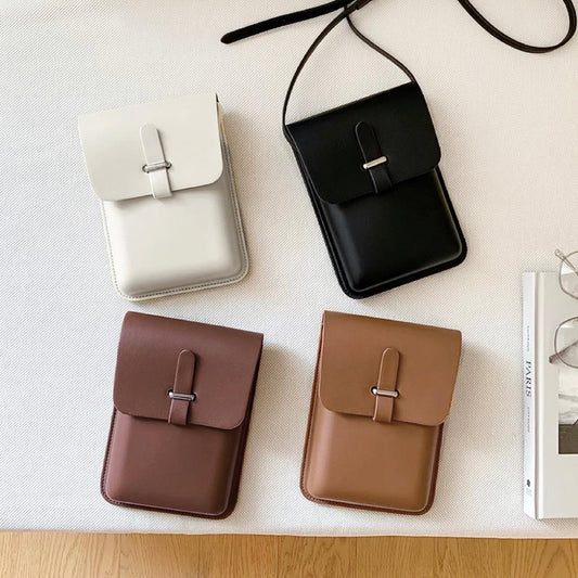 Front view of Four minimalist rigid PU leather crossbody bags in white, black, brown, and tan with loop through.