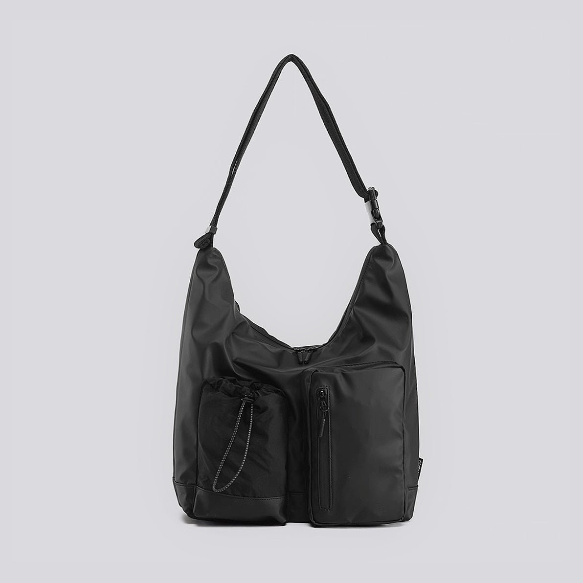 Front view of the black multi-pocket nylon bag,  showcasing durable and water-resistant fabric.