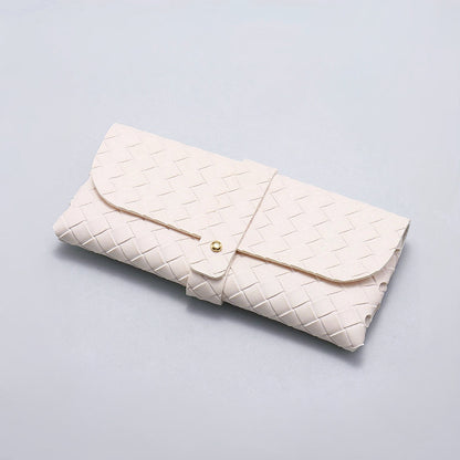 Close-up of white Portable Woven Leather Glasses Case with buckle closure, ideal for  daily use.