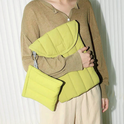 Soft puffy cotton laptop sleeve with a quilted cloud-like texture.