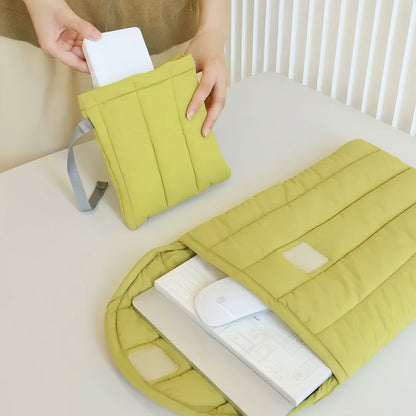 The model is demonstrating how to place a power supply unit into the power supply organizer pouch, with a laptop sleeve positioned nearby.