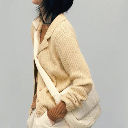 Model carrying a white polyester bag on the shoulder, easy for commuting and weekends.
