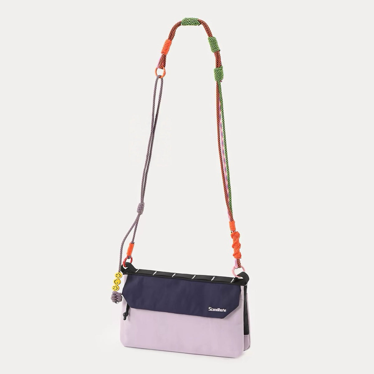 Front view of the lilac Rope Play convertible bag with a long crossbody strap.
