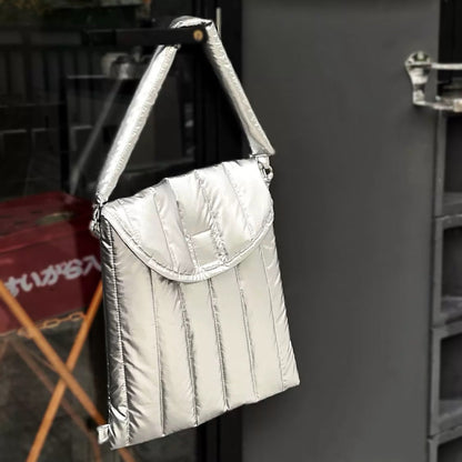 Front view of Silver padded polyester laptop sleeve with removable strap.