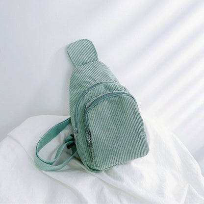 Folded view of green Simple Corduroy Sling Bag, ideal for errands and gifting.