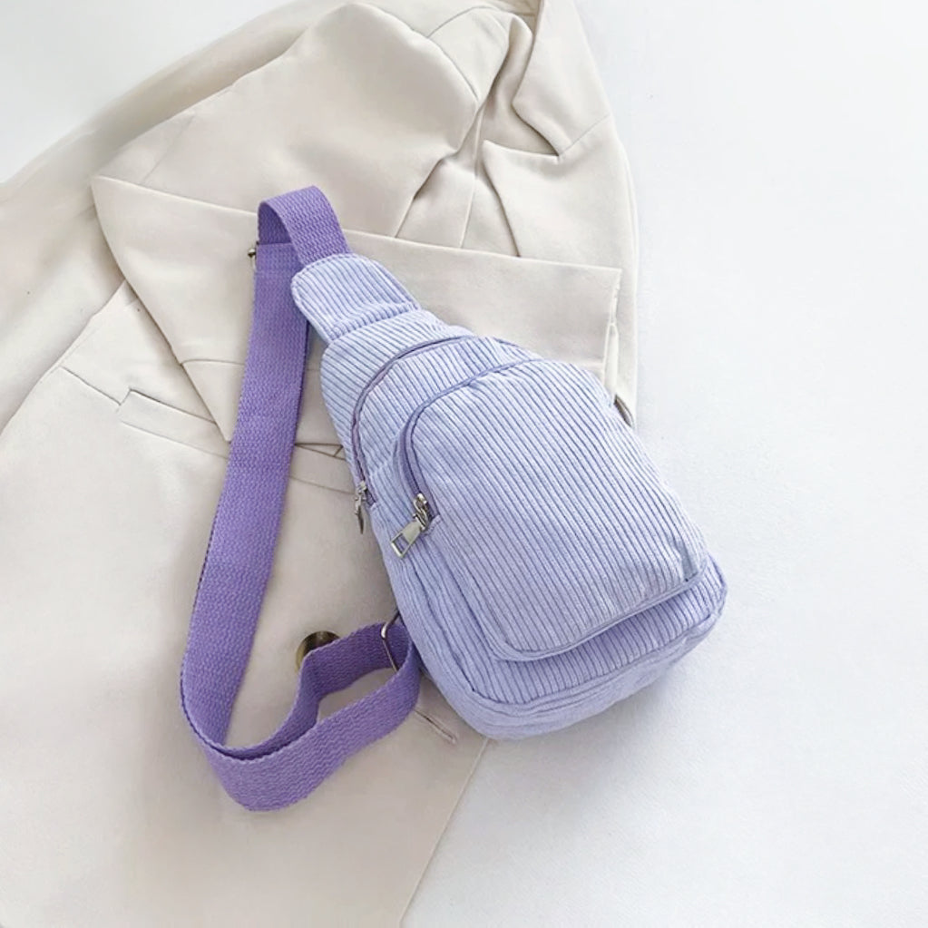Folded view of purple Simple Corduroy Sling Bag, great for everyday carry and travel.