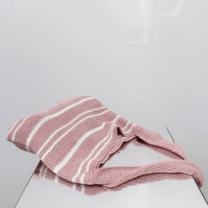 Flat lay of Simple Striped Knitted Bag in pink and white, ideal for errands and gifting.