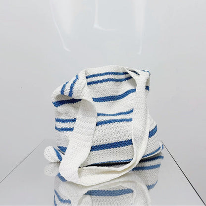 Folded view of blue Simple Striped Knitted Bag, easy for commuting and weekends.