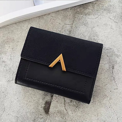 Close-up of Small Wallet With Nubuck Leather Flap in black, easy for organizing cards and cash.