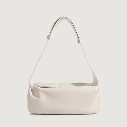 Folded view of Soft Leather Baguette Bag in white, easy for commuting and weekends.