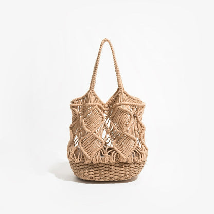 Front view of spiral pattern hollow crochet bag with woven base and braided handle in camel.