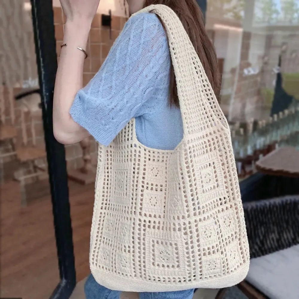Model carrying a cream white Square Pattern Crochet Bag on shoulder, easy for commuting and weekends.